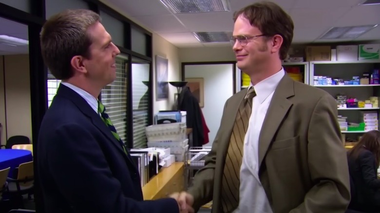 Andy and Dwight shake hands 