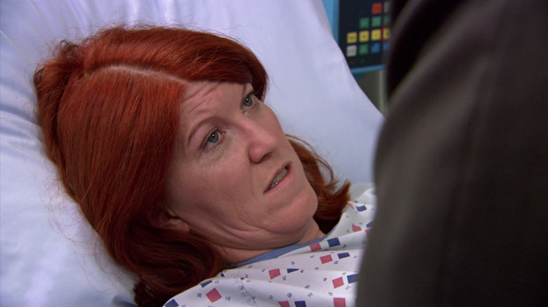 Meredith in a hospital bed