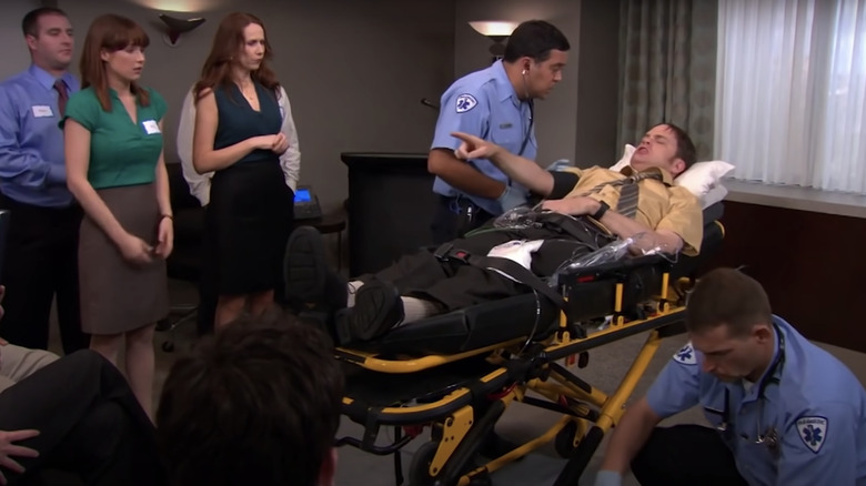 Dwight in a stretcher