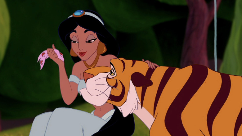 Jasmine talks with her pet tiger by the fountain in Aladdin (1992)