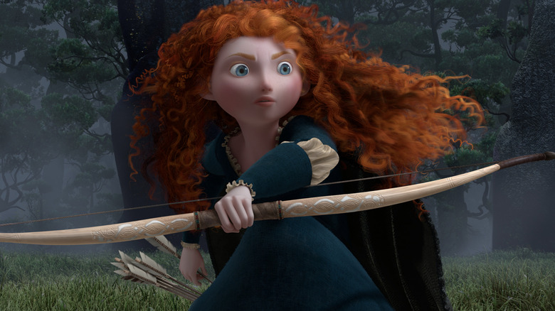 Merida uses her bow and arrow to defend herself in Brave (2012)