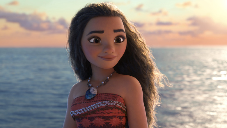 Moana gazes out at the water in Moana (2016)