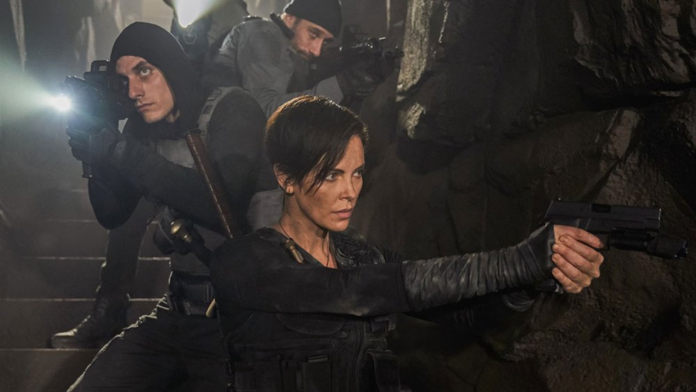 Andy (Charlize Theron) leads her team into uncertain danger in The Old Guard