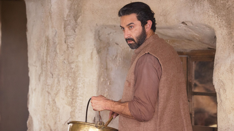 Pej Vahdat looking concerned in "The Old Man"