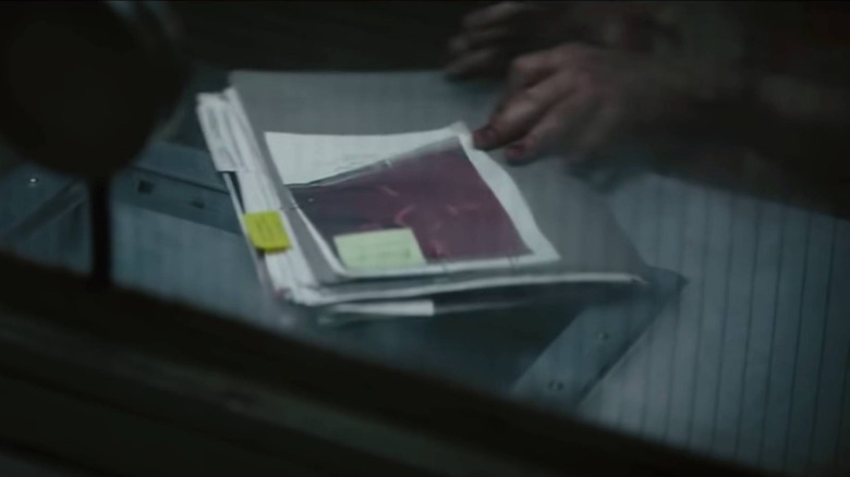 Joker receiving a file