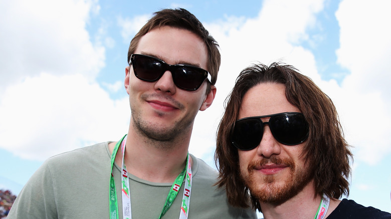 McAvoy and Hoult smile in sunglasses