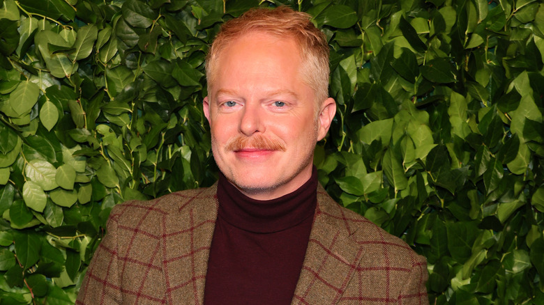 Jesse Tyler Ferguson smirking