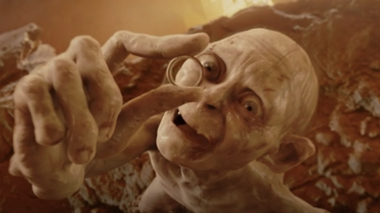 Gollum gazing up at the One Ring in Return of the King