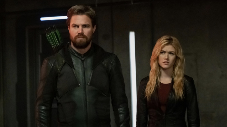 Oliver and Mia looking unamused in Arrow