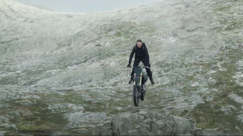 Ethan Hunt riding a motorcycle off a cliff