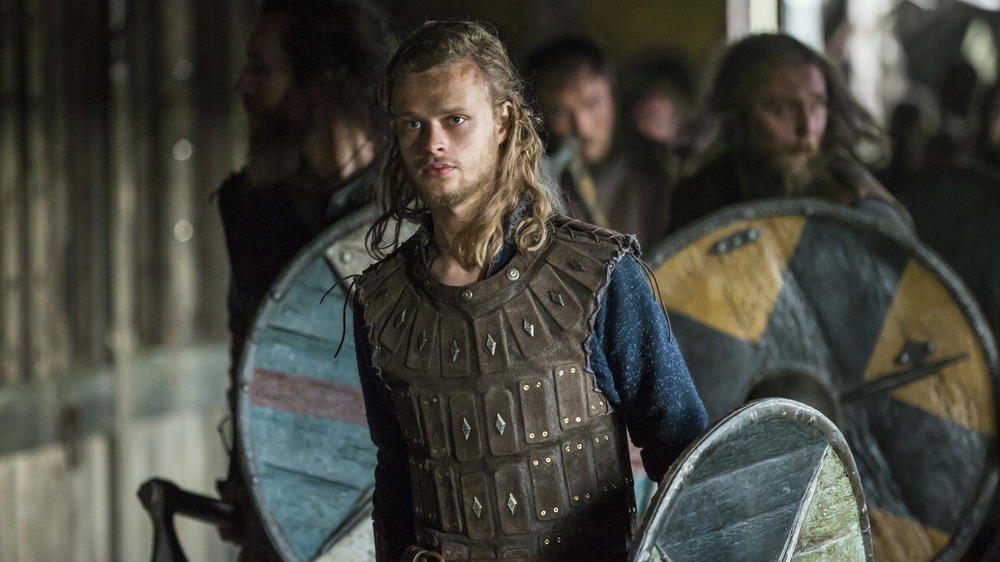 Edvin Endre holding a shield