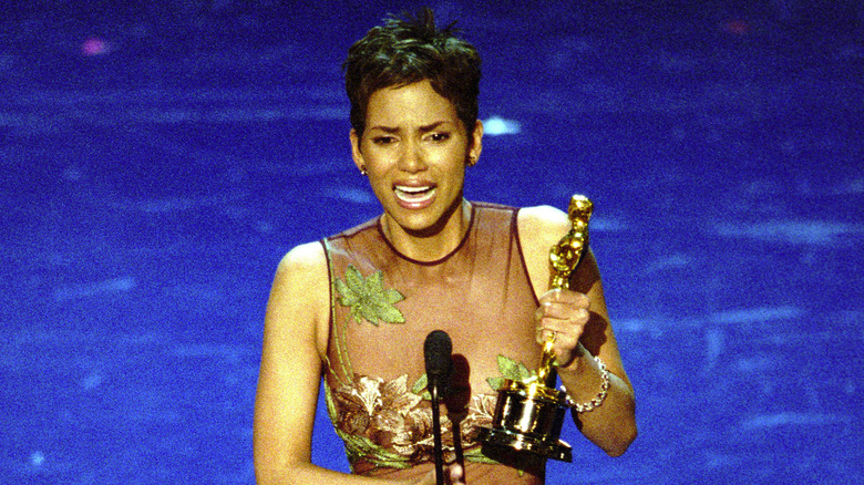 Halle Berry holding the Best Actress Oscar statuette