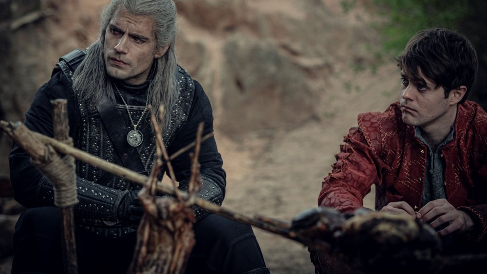 Henry Cavill as Geralt and Joey Batey as Jaskier on The Witcher