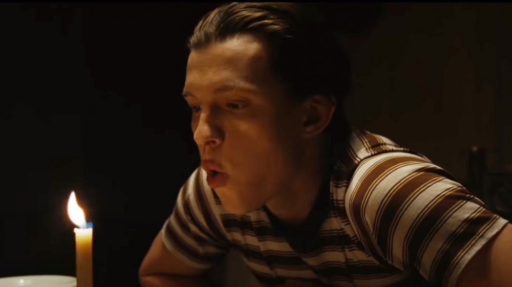 Tom Holland as Arvin Russell in The Devil All the Time