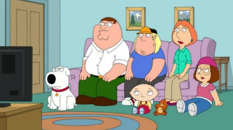 The Griffin family watching TV
