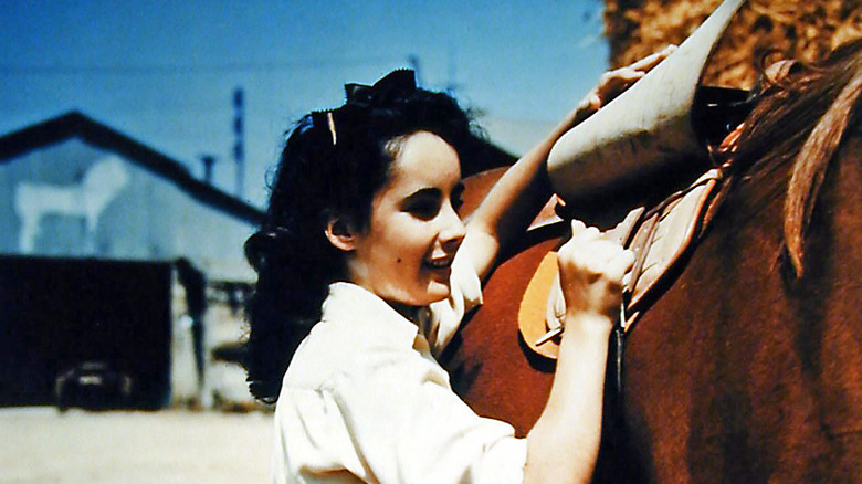 Elizabeth Taylor with her horse.
