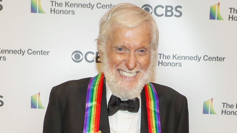 A bearded Dick Van Dyke offers a wide grin