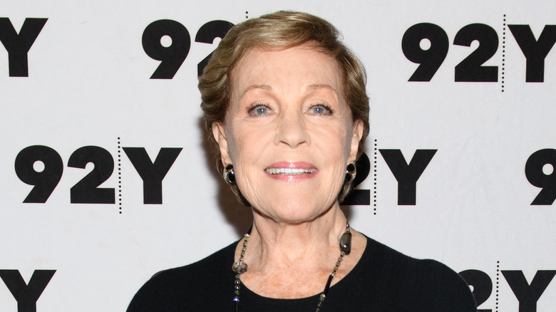 Julie Andrews lifts her chin and smiles