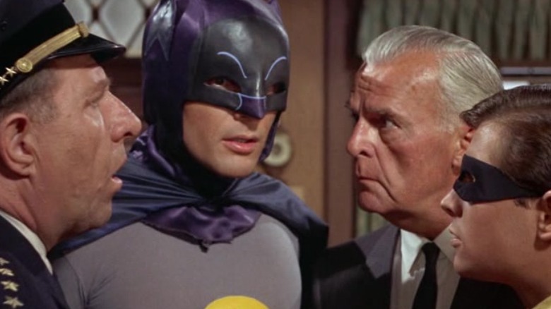 1960s Batman and Robin discuss crime