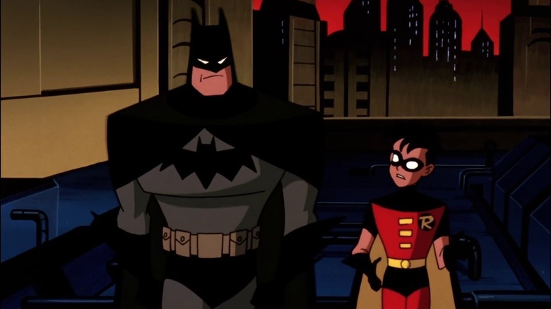 Batman and Robin consult on crime