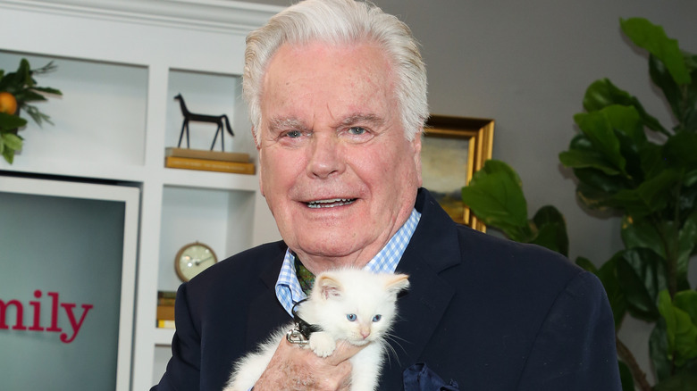 Robert Wagner holding kitten