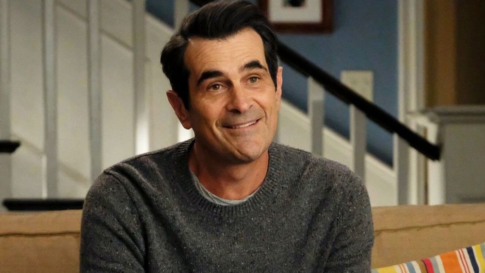 Phil Dunphy wearing grey sweater