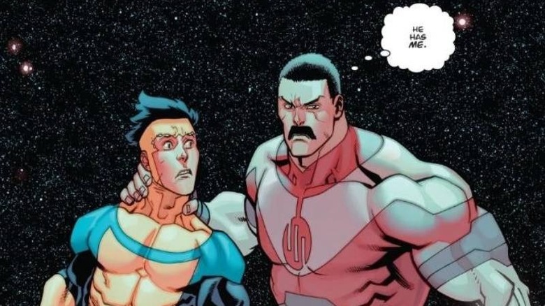 Thragg holds Mark in space in the "Invincible" comics