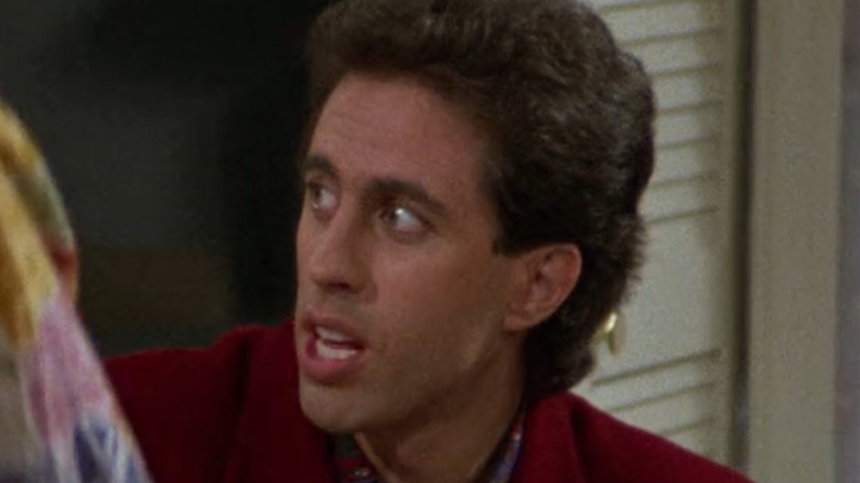 Jerry Seinfeld raises his eyebrows on Seinfeld