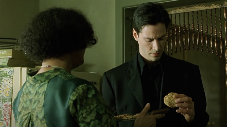 Neo eating cookies in The Matrix