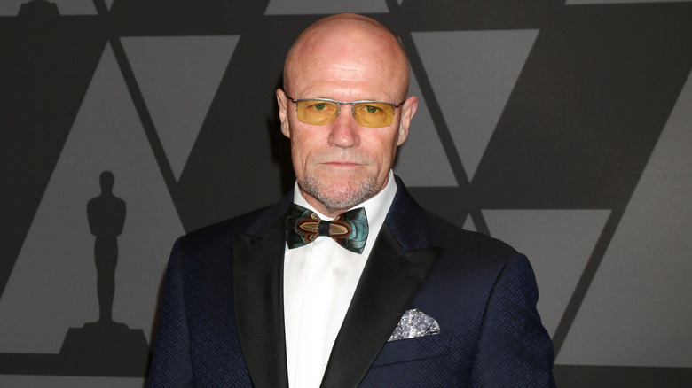 Michael Rooker in sunglasses and tuxedo