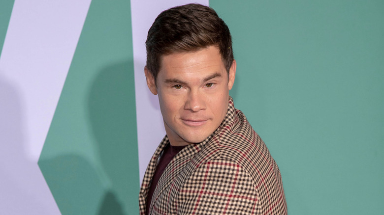 Adam Devine posing