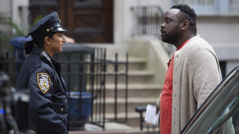 Brian Tyree Henry talking to a cop