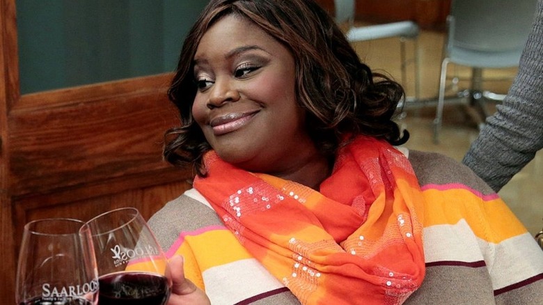 Retta Donna Meagle smiling wine cheers