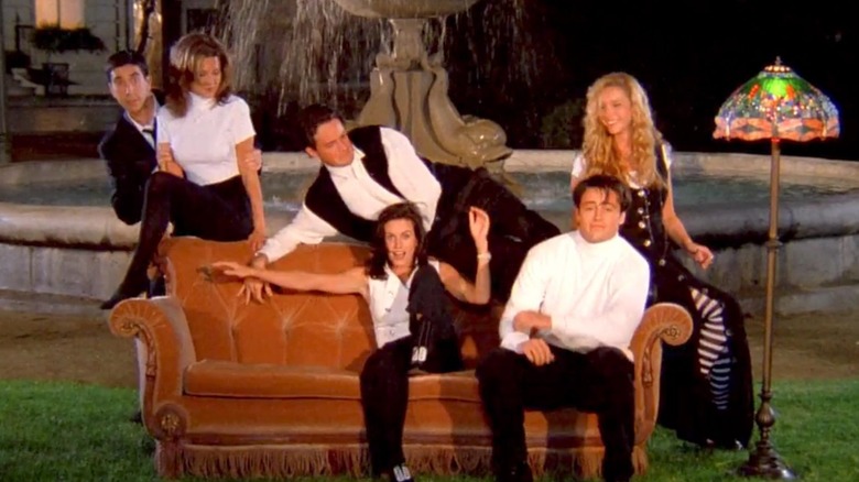 Friends cast poses during intro