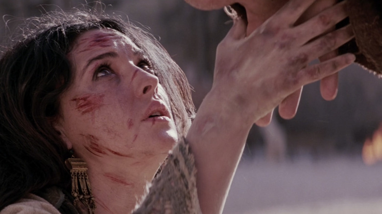 Mary Magdalene reaches for Jesus