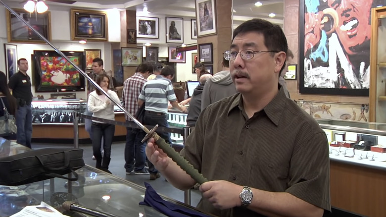 Mike Yamasaki holding katana