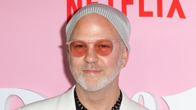 Ryan Murphy wearing pink sunglasses