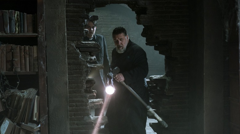 Father Esquibel and Father Gabriele Amorth investigating