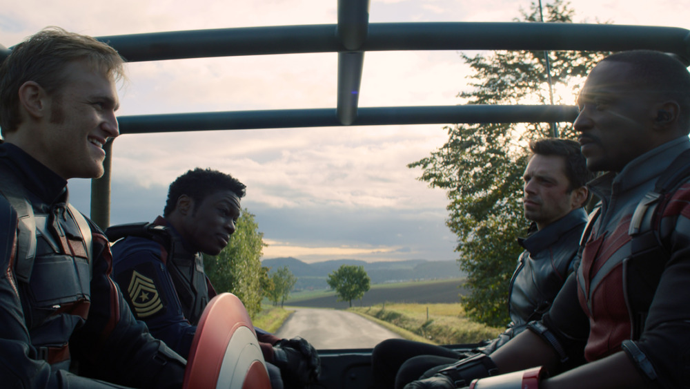 John, Battlestar, Bucky, and Sam in a Jeep