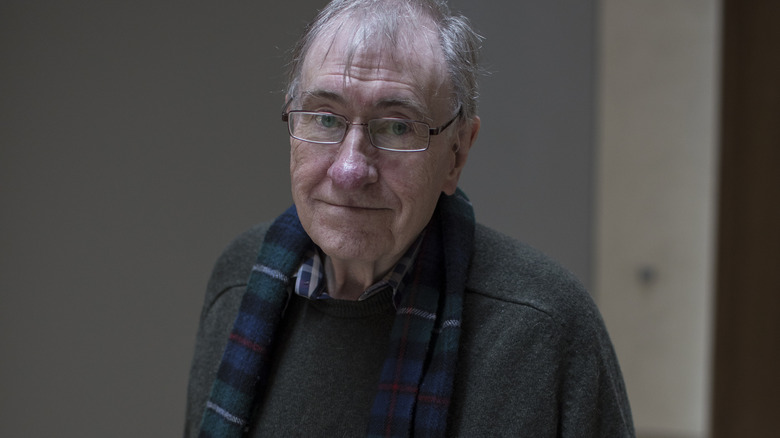 Christopher Priest in glasses and scarf