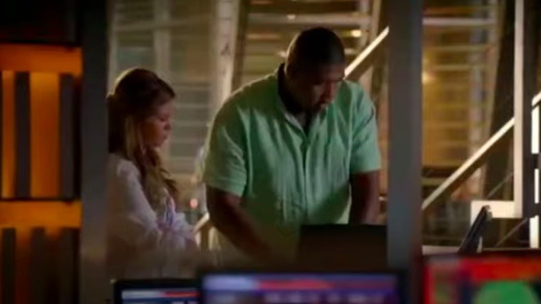 Amber Lancaster and Omar Miller acting on CSI: Miami