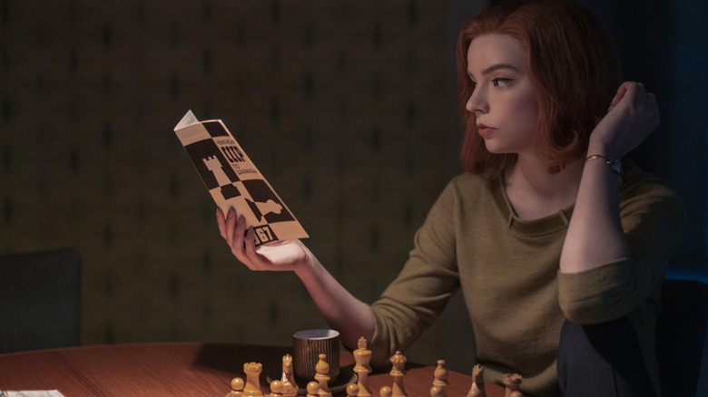 Beth playing chess