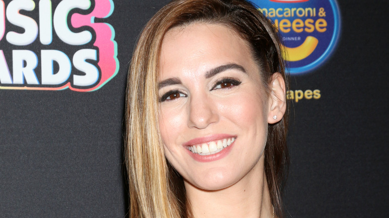 Christy Carlson Romano smiles at an award show