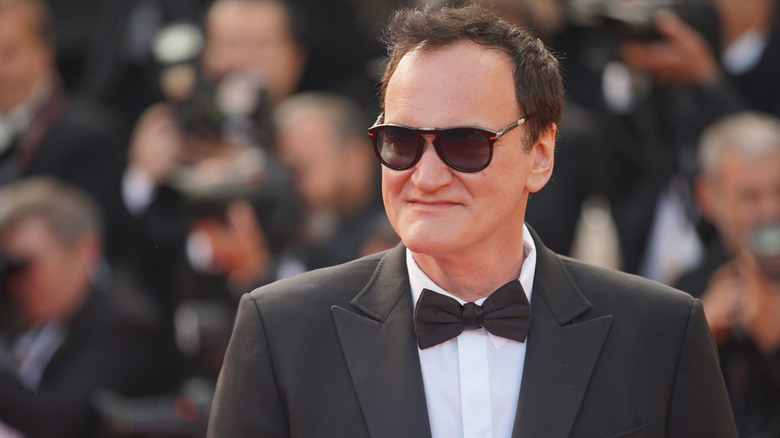 Quentin Tarantino wearing tuxedo and sunglasses