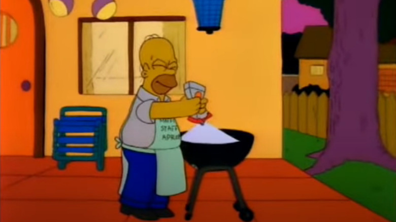 Homer lights a grill