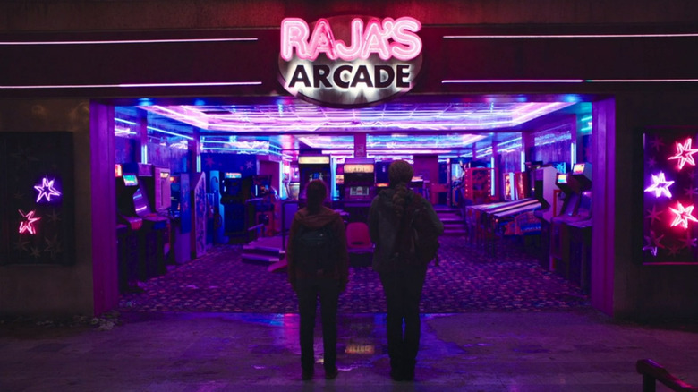 Ellie and Riley enter arcade