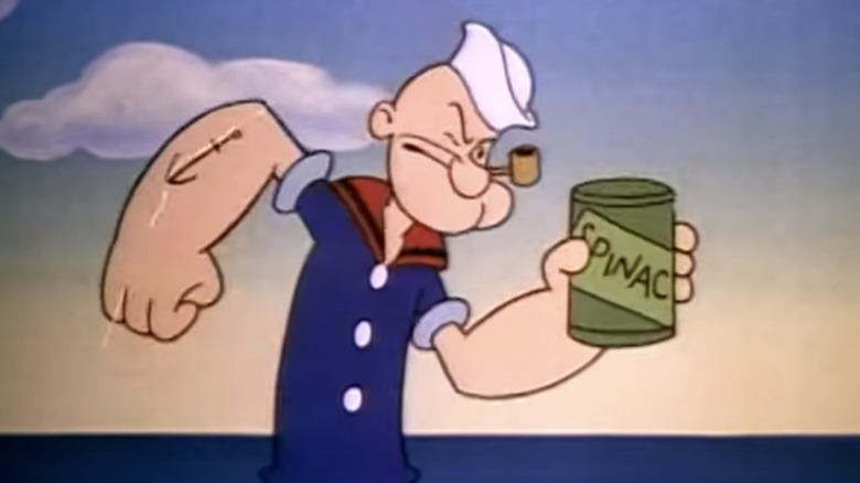 Popeye eying a can of spinach