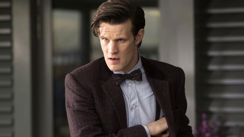 Eleventh Doctor reaching in coat