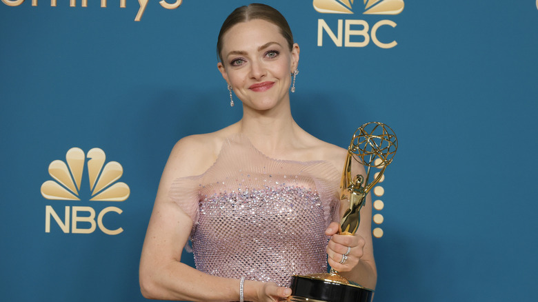 Amanda Seyfried holding Emmy