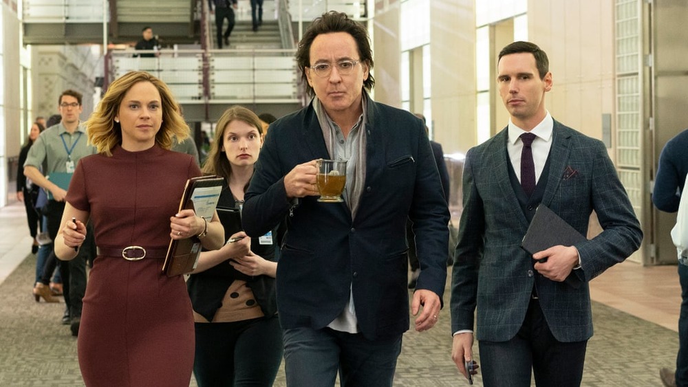 John Cusack as Dr. Kevin Christie on Utopia